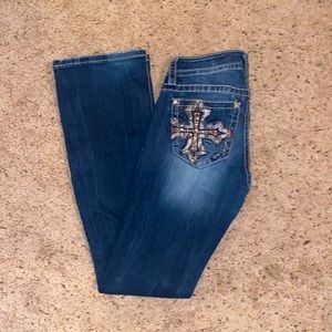 Super cute, lightly used boot cut Miss Me jeans. Size: 28, length: 34.